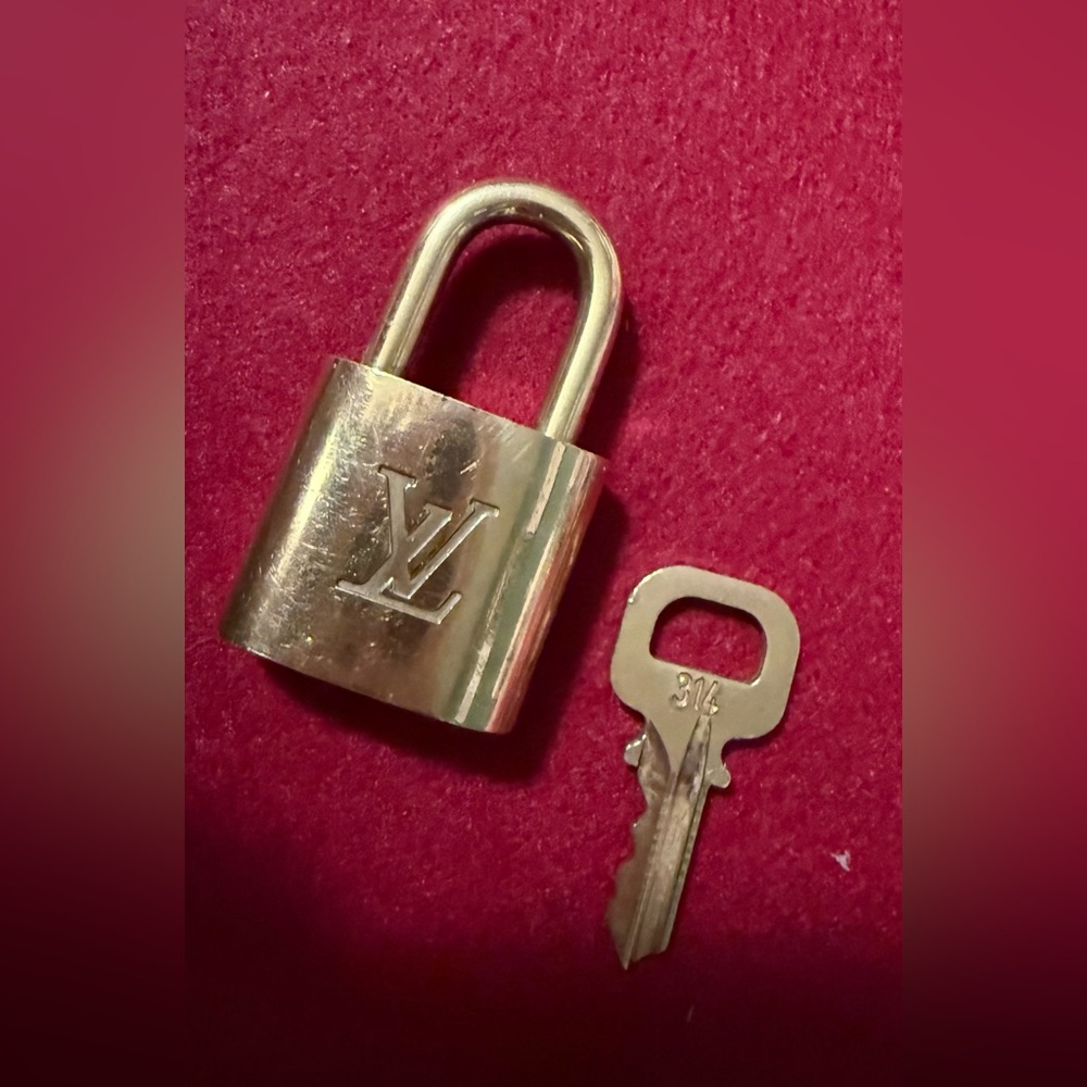 Authentic Louis Vuitton Gold Padlock with Key